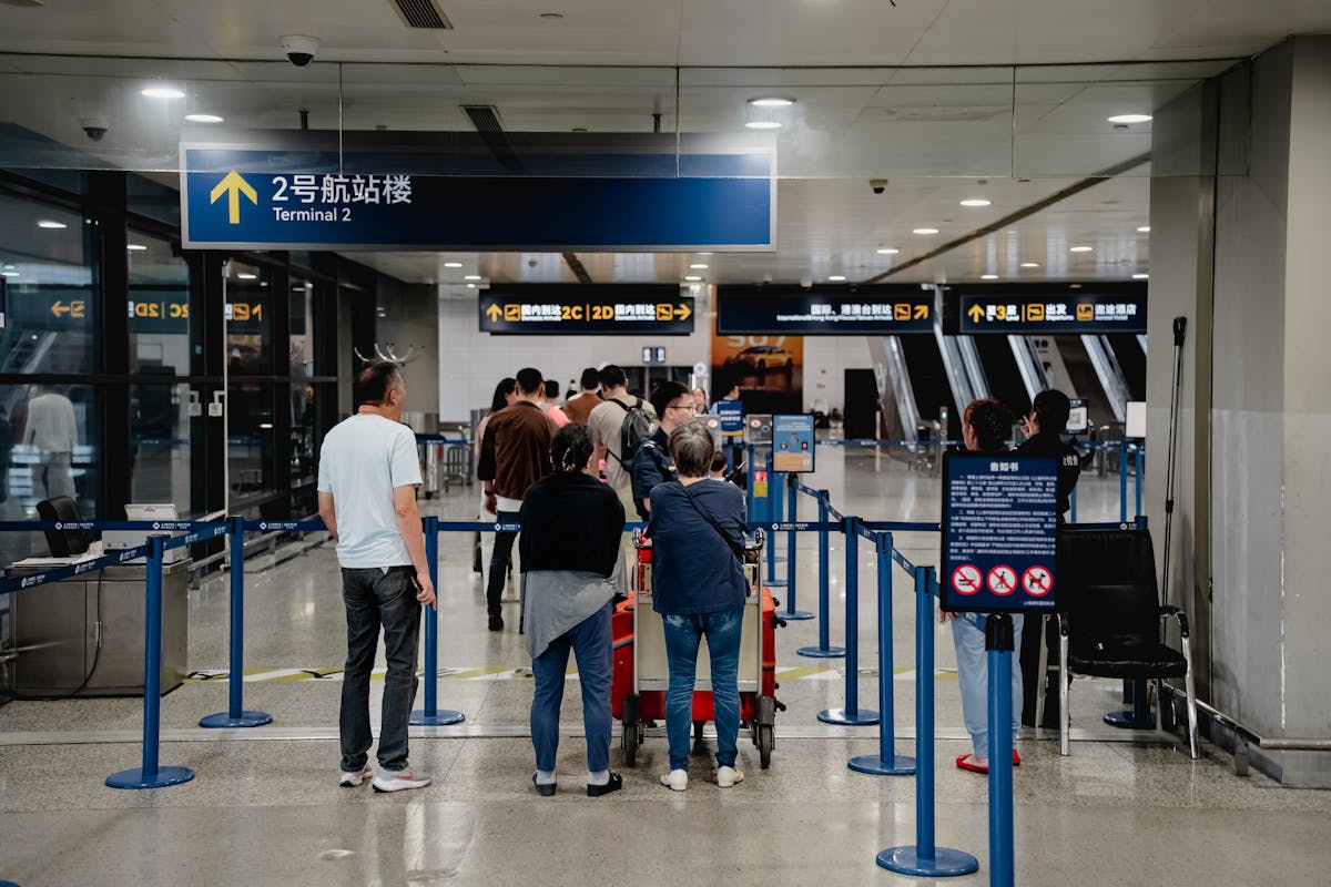 Passengers queuing at airport immigration and customs in China