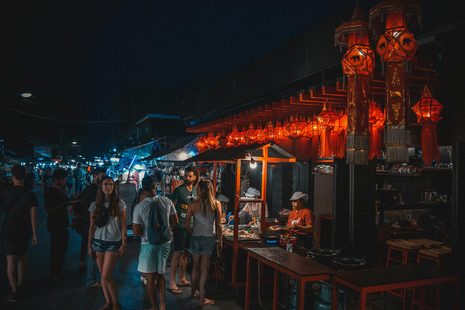 Beijing night market with food stalls and glowing lights
