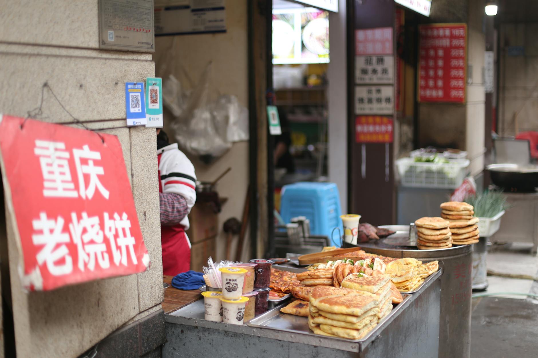 Beijing street food market with vendors selling local snacks
