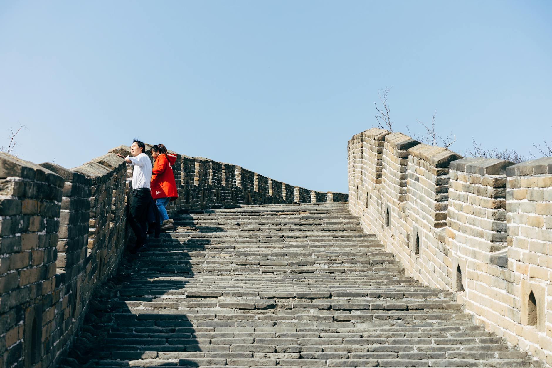 Tourist walking along the Great Wall of China Beijing visit