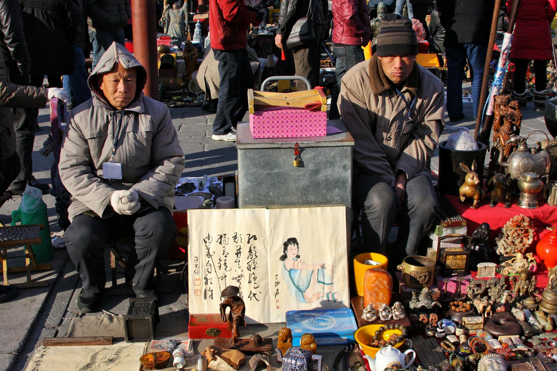 Panjiayuan antique market stalls with traditional Chinese crafts in Beijing