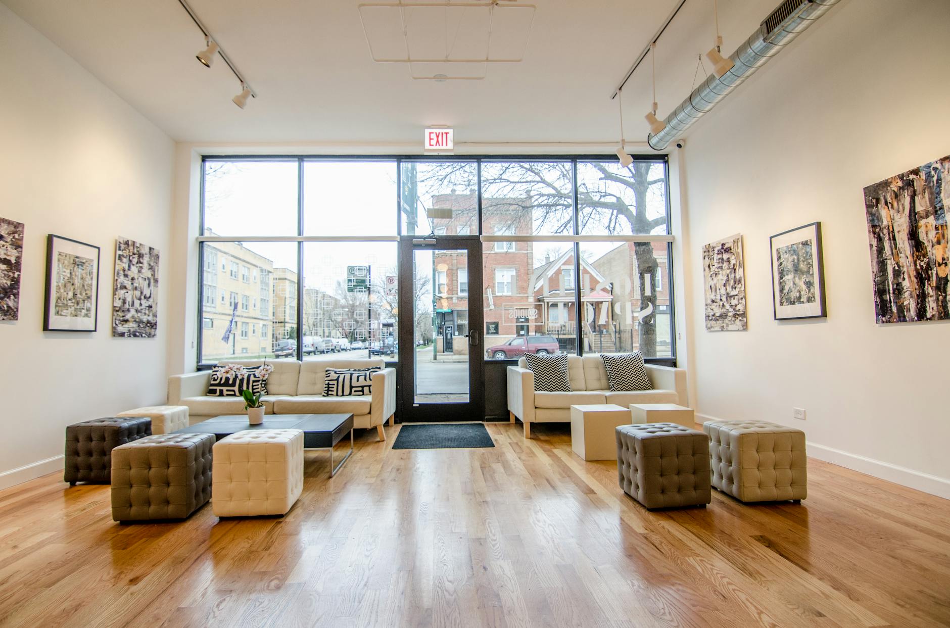 Contemporary art gallery interior with large windows