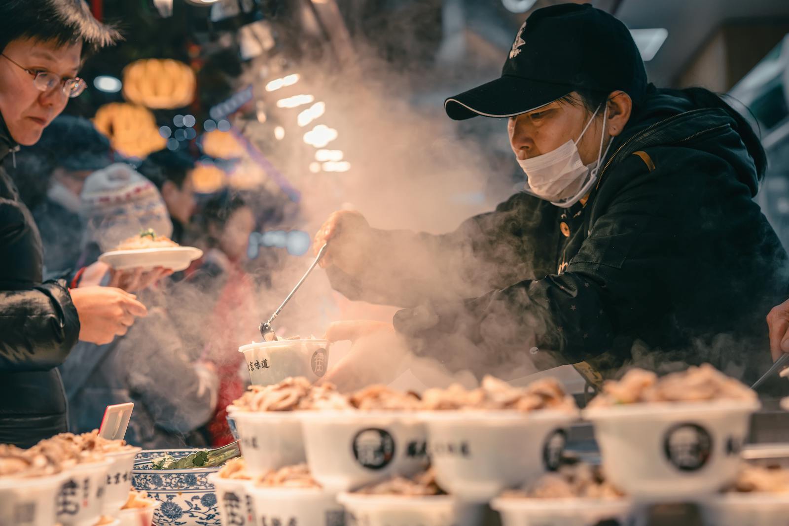 Beijing street food market vendor selling skewers