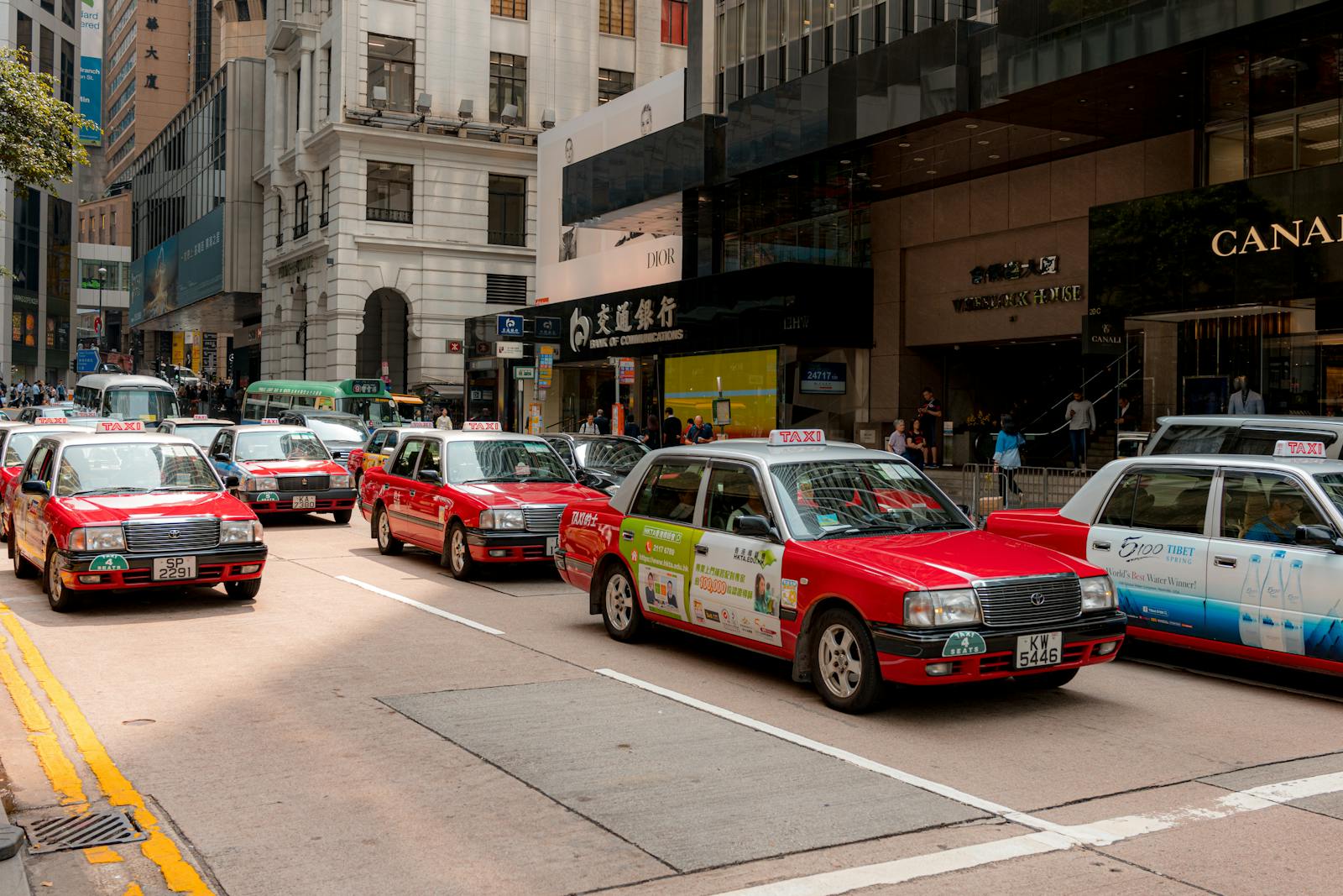 Beijing busy street with taxis and city traffic