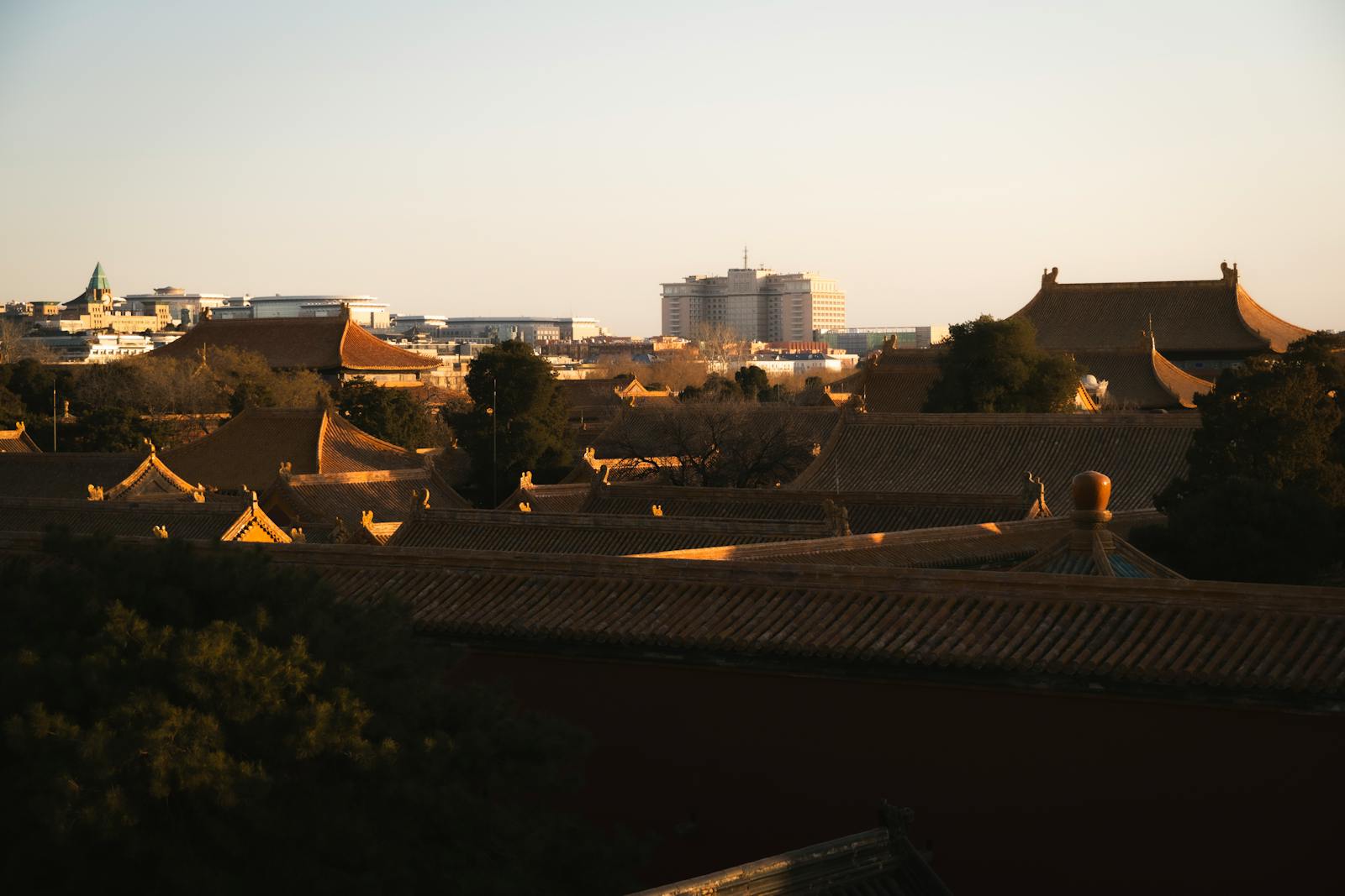Forbidden City rooftops at sunset near Wangfujing hotels