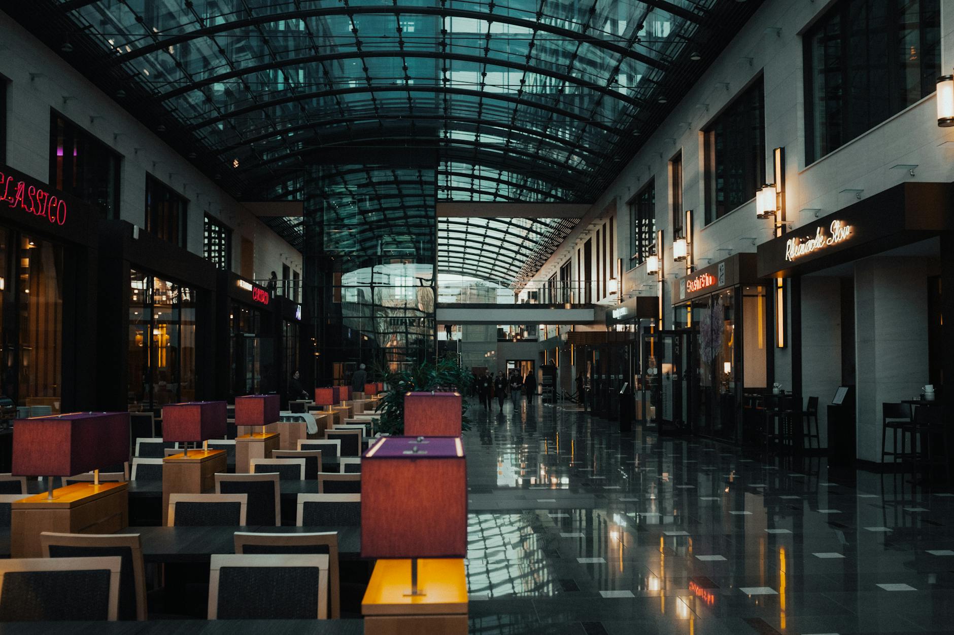 Elegant modern shopping mall with a glass atrium