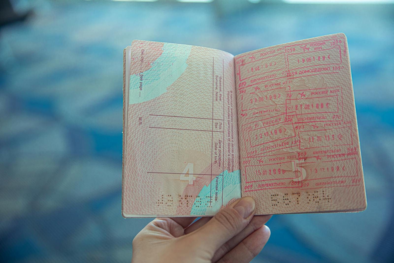 Passport with visa stamps for China 30-day visa-free entry