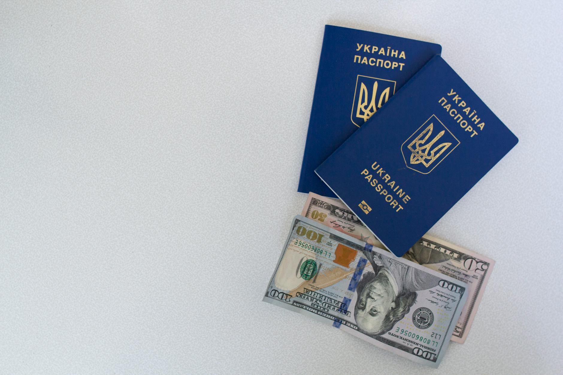 Chinese passport and visa documents stacked together for submission