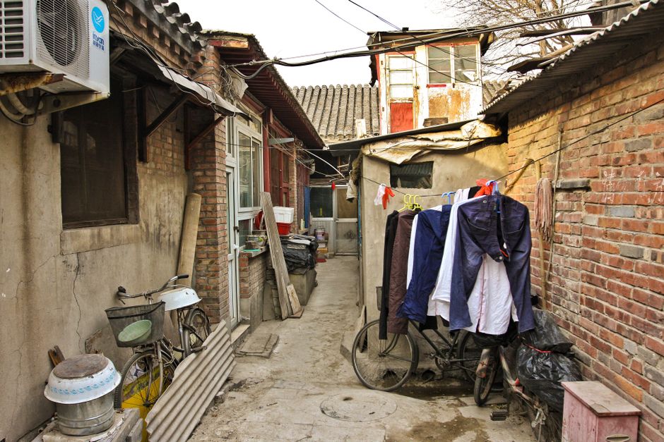 Traditional Beijing hutong alley — the neighbourhood choice that defines your trip