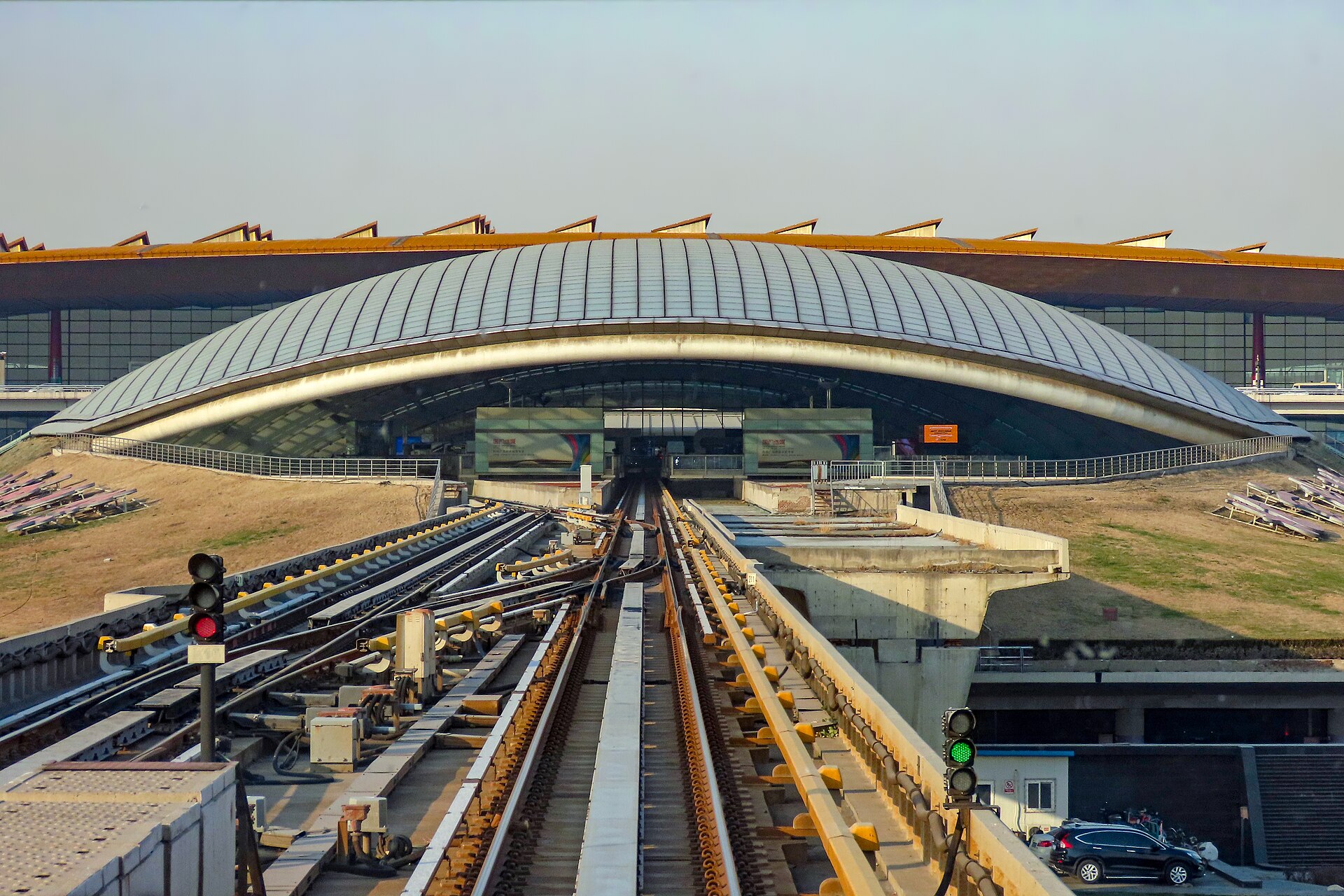 The Airport Express station beneath the curved roof of Terminal 3 at Beijing Capital International Airport