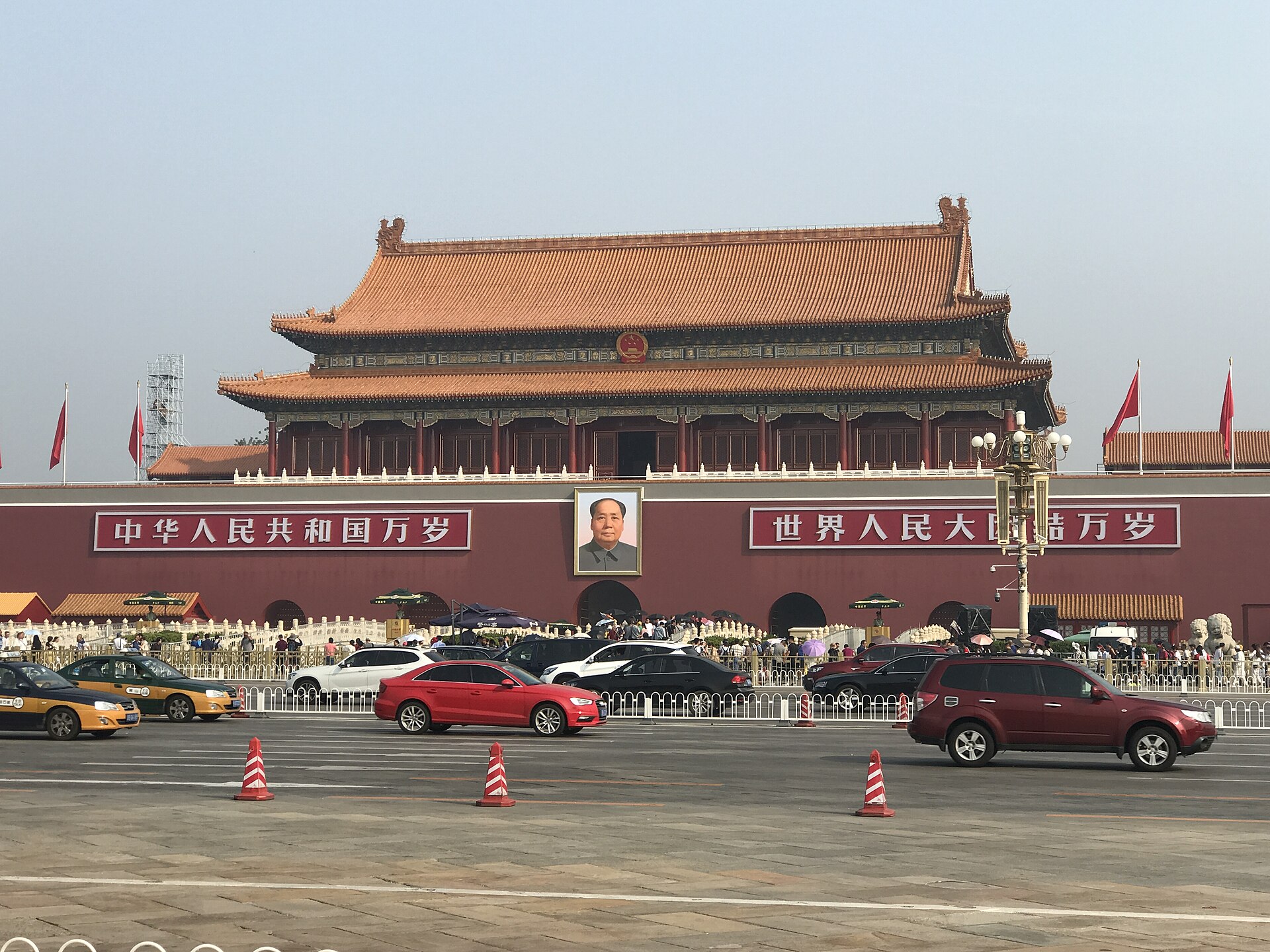 The Gate of Heavenly Peace at the north end of Tiananmen Square with the Mao portrait and red slogan boards