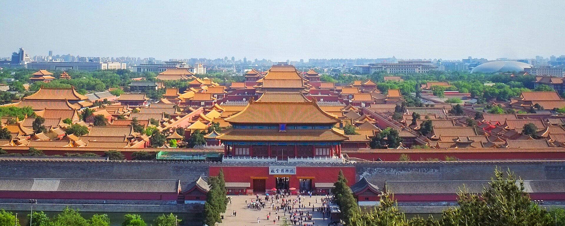 Golden roofs of Beijing's Forbidden City stretch south from Shenwu Gate in a panoramic view from Jingshan Park.